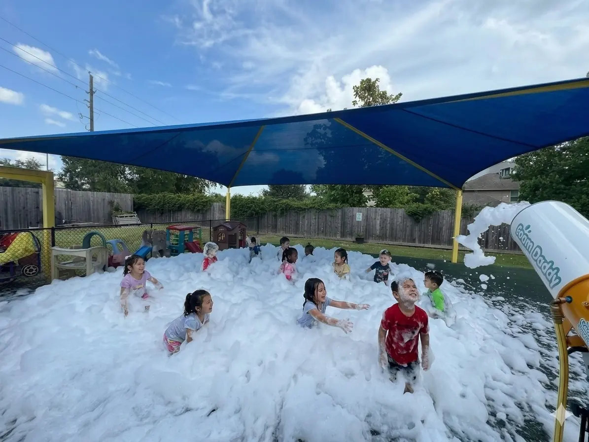Foam Day! Summer fun under the shade sail